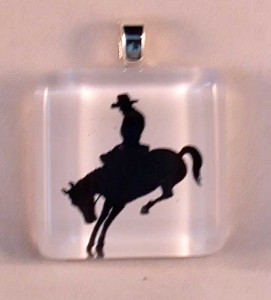 Cowboy on a horse, fused glass pendant